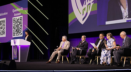 Woman presenting at podium at VAM